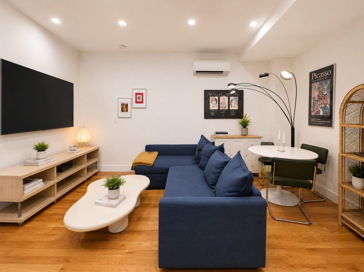 Living room with an open kitchen, virtually staged