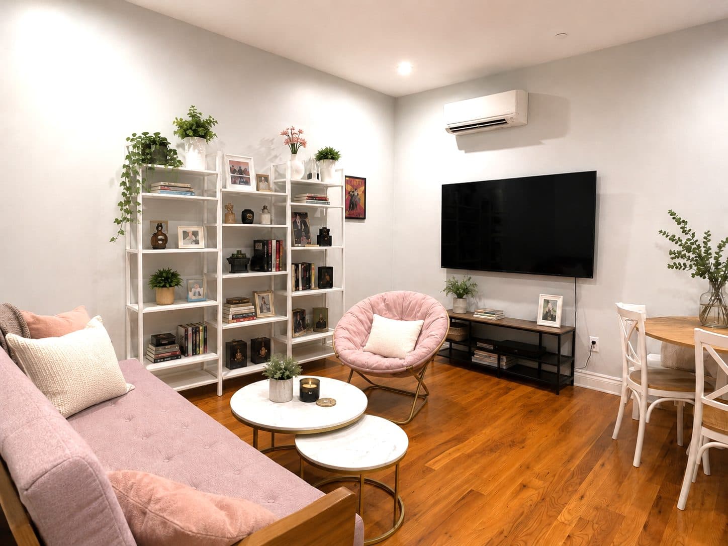 Bright living room with built-in shelving, virtually staged