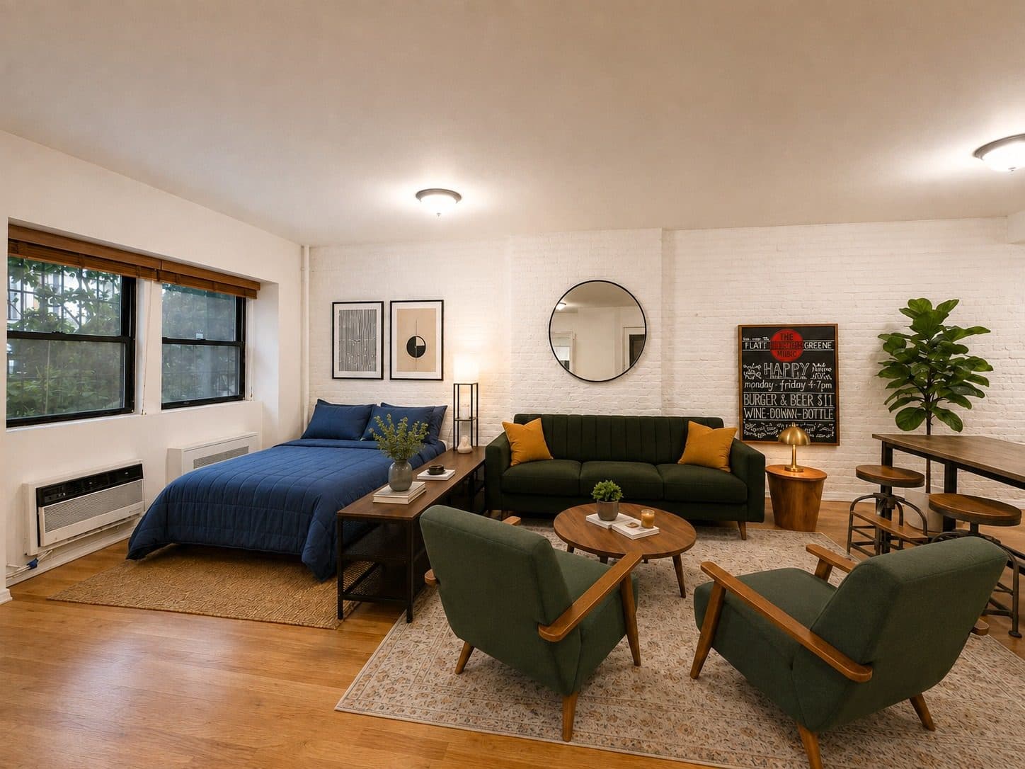 Studio apartment with exposed white brick and a combined living and sleeping area, virtually staged