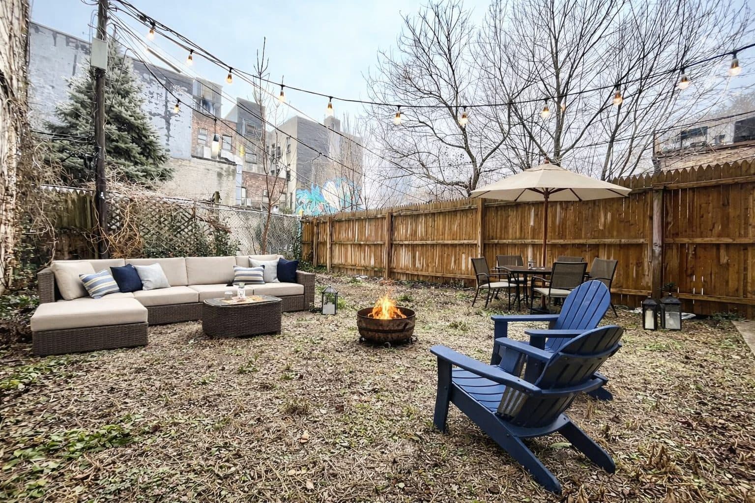 Private backyard with seating and string lights, virtually staged